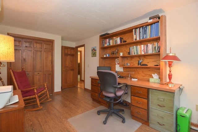 33 Rockmeadow Rd, Uxbridge, MA 01569 - office with light wood finished floors, built in study area, and baseboards
