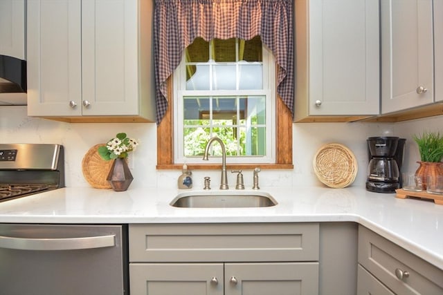 33 Rockmeadow Rd, Uxbridge, MA 01569 - kitchen featuring a sink, appliances with stainless steel finishes, backsplash, gray cabinets, and light stone counters