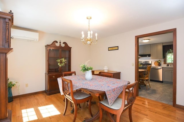 33 Rockmeadow Rd, Uxbridge, MA 01569 - dining area featuring a wall mounted AC, a chandelier, light wood finished floors, and baseboards