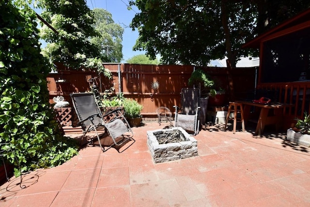 419-421 Court St, New Bedford, MA 02740 - fenced backyard featuring a fire pit and a patio