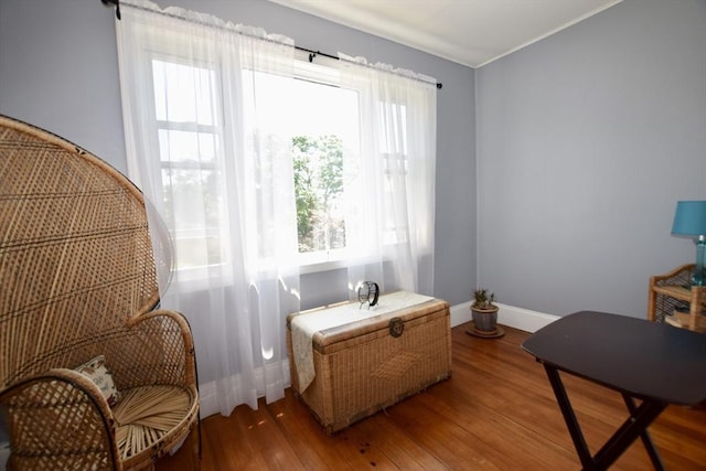 419-421 Court St, New Bedford, MA 02740 - living area with light wood-style flooring, baseboards, and crown molding
