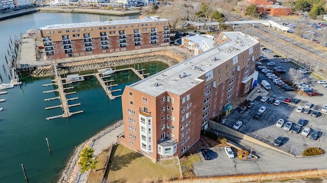 birds eye view of property featuring a water view