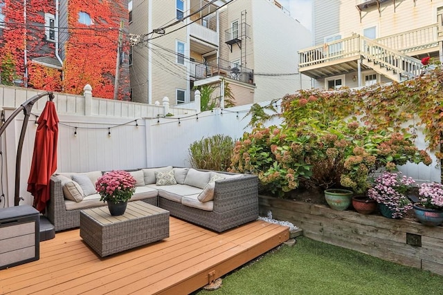 deck featuring outdoor lounge area