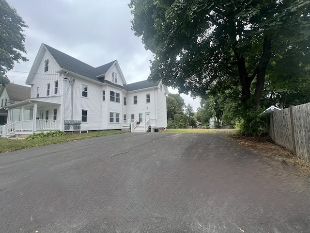 view of home's exterior featuring a porch