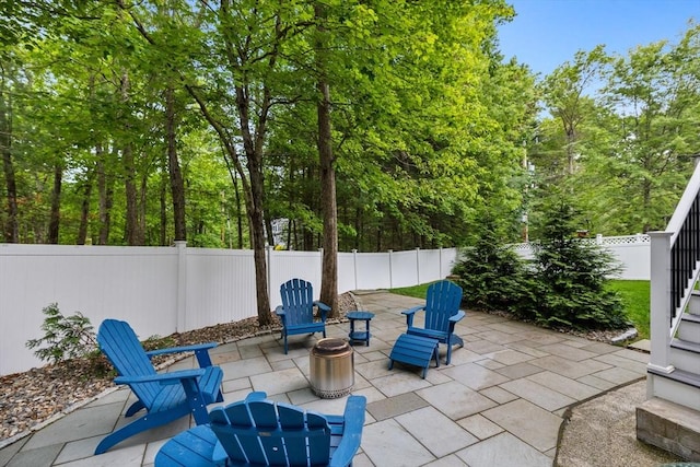 1 Eleanor Dr, Wilmington, MA 01887 - fenced backyard with a patio area