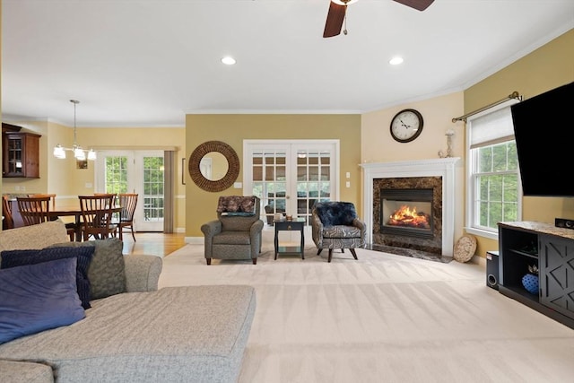 1 Eleanor Dr, Wilmington, MA 01887 - living area featuring ornamental molding, ceiling fan, a high end fireplace, recessed lighting, and a chandelier
