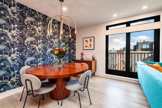 dining area with light hardwood / wood-style flooring