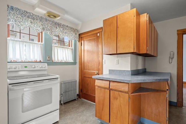 kitchen with brown cabinetry, radiator, and white range with electric stovetop