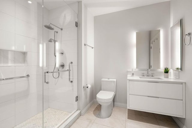 100 Shawmut Ave Unit 202, Boston, MA 02118 - full bath featuring a shower stall, toilet, vanity, and baseboards