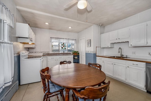 kitchen featuring a baseboard heating unit, sink, white cabinets, and white range with electric stovetop