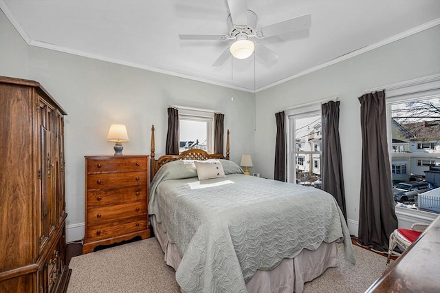 bedroom featuring crown molding and ceiling fan