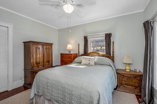 bedroom with ceiling fan, ornamental molding, and wood-type flooring