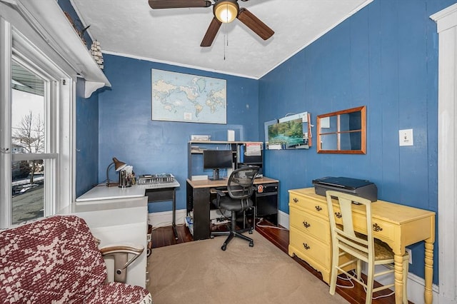 office space with crown molding and ceiling fan