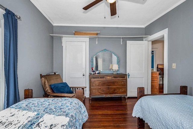 bedroom featuring crown molding, ceiling fan, and dark wood-type flooring