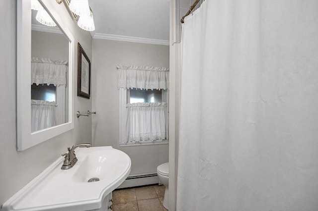 bathroom featuring sink, baseboard heating, tile patterned flooring, ornamental molding, and toilet