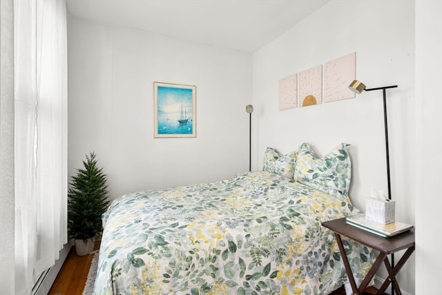 bedroom featuring hardwood / wood-style flooring