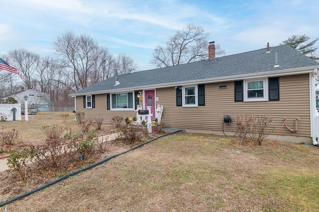 ranch-style house with a front lawn