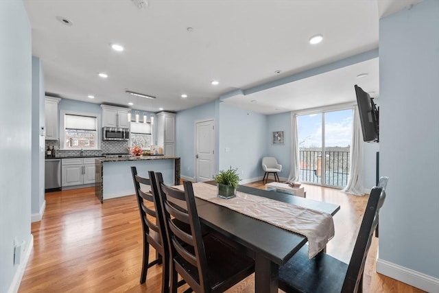 dining room featuring light wood-type flooring