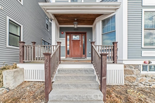 doorway to property with covered porch