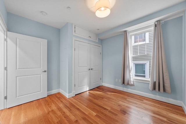 unfurnished bedroom featuring light hardwood / wood-style floors