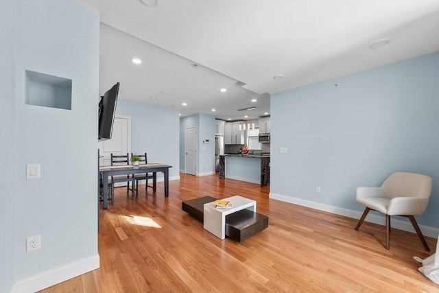 living room featuring light hardwood / wood-style flooring