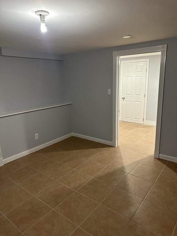 view of tiled spare room