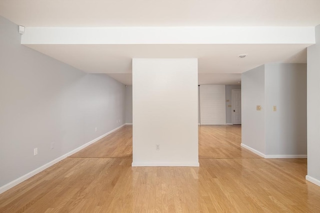 unfurnished room with light hardwood / wood-style floors