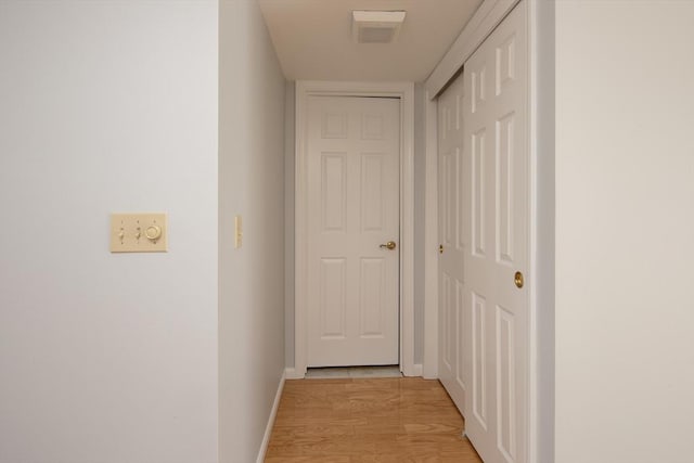 hall featuring light wood-type flooring