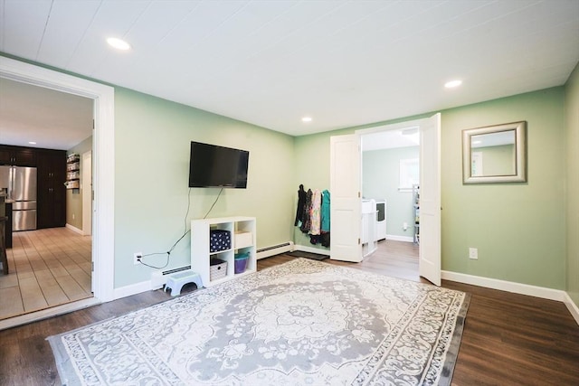 54 Mountain View Rd, Leominster, MA 01453 - living area with a baseboard heating unit, dark wood-type flooring, baseboards, recessed lighting, and washer / dryer