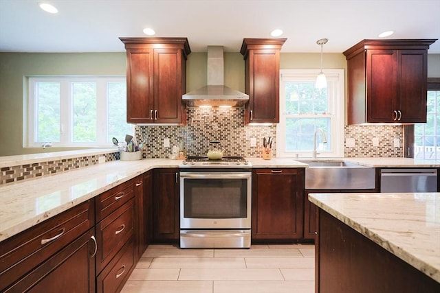 54 Mountain View Rd, Leominster, MA 01453 - kitchen with wall chimney exhaust hood, stainless steel appliances, a sink, plenty of natural light, and recessed lighting
