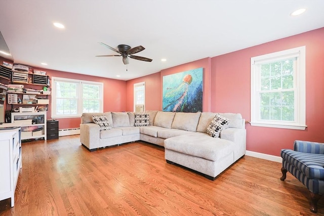 54 Mountain View Rd, Leominster, MA 01453 - living room with a baseboard radiator, ceiling fan, light wood-style floors, recessed lighting, and baseboards