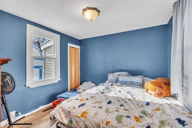 bedroom featuring hardwood / wood-style flooring