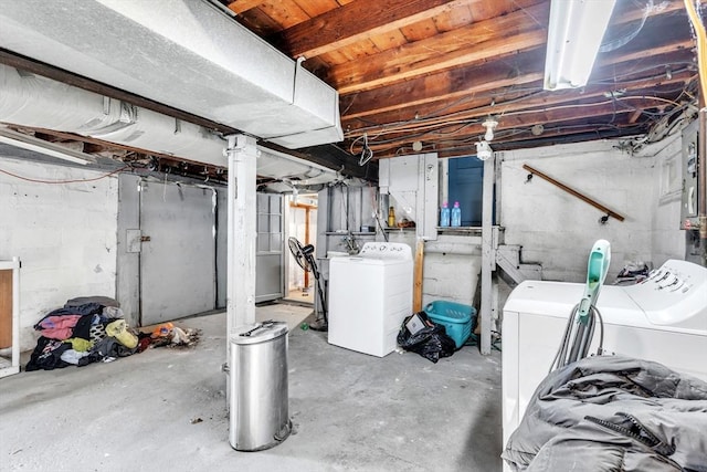 basement featuring washing machine and dryer