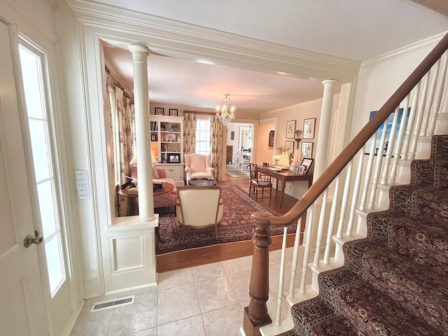 148 Scantic Rd, Hampden, MA 01036 - foyer featuring stairs, ornamental molding, light tile patterned flooring, ornate columns, and a chandelier