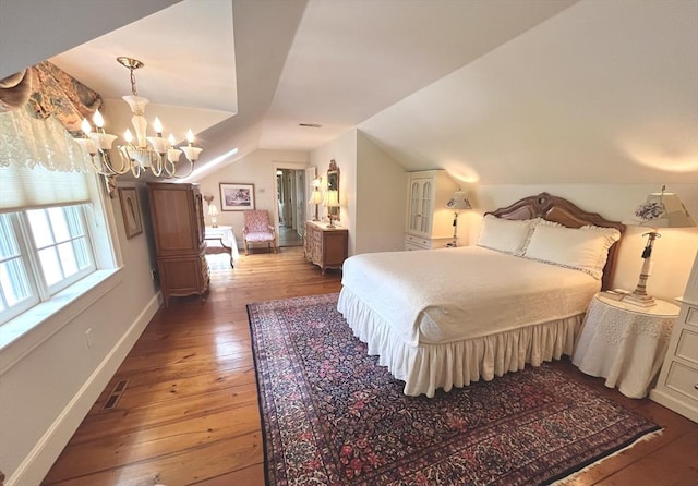 148 Scantic Rd, Hampden, MA 01036 - bedroom with hardwood / wood-style flooring, lofted ceiling, and a chandelier