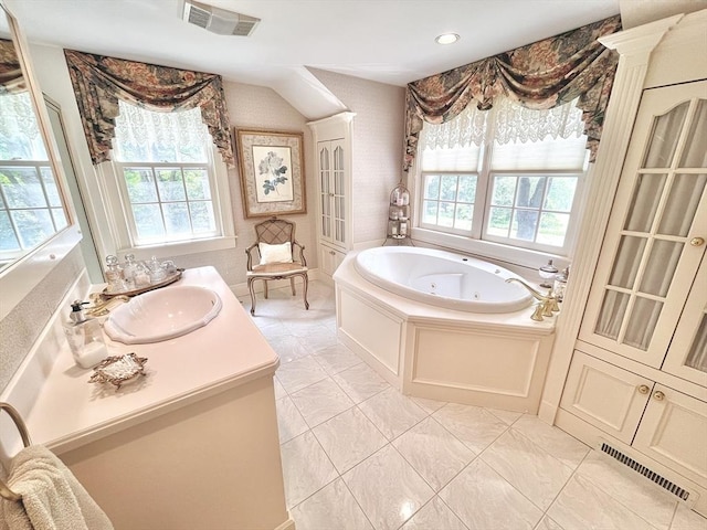 148 Scantic Rd, Hampden, MA 01036 - bathroom featuring plenty of natural light, a jetted tub, vanity, and recessed lighting
