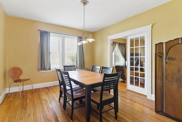 6-R Hazel Ter Unit 6, Salem, MA 01970 - dining room with light wood-style flooring and a chandelier