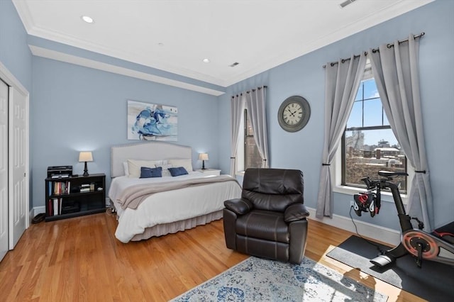 bedroom featuring recessed lighting, baseboards, light wood-style flooring, and ornamental molding