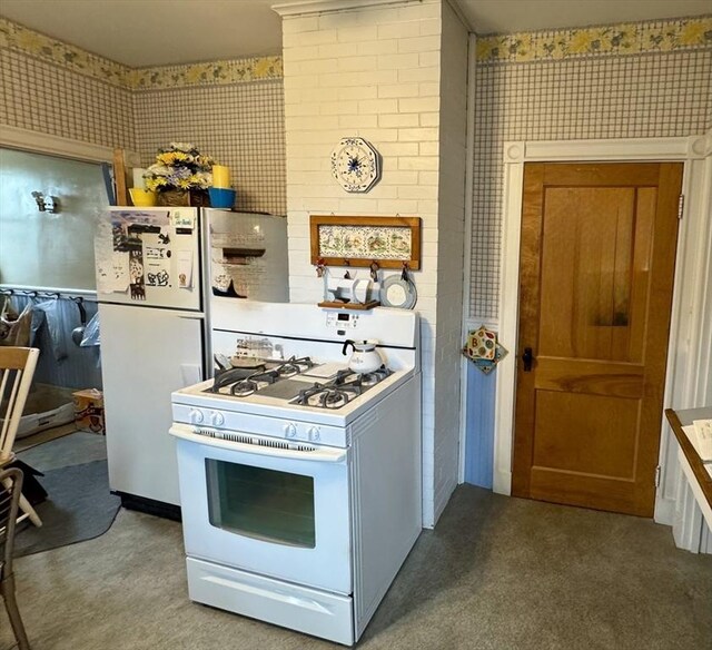 39 Newbury Ave, Quincy, MA 02171 - kitchen featuring white range with gas cooktop, wallpapered walls, and carpet floors