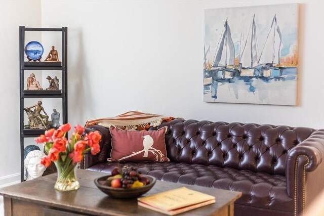 living room featuring baseboards