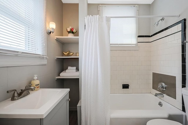 full bathroom with vanity, toilet, and shower / bath combo