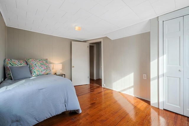 unfurnished bedroom featuring hardwood / wood-style flooring