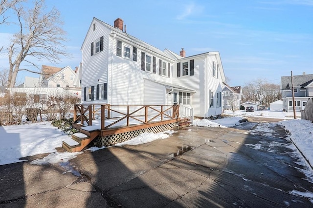 exterior space featuring a wooden deck