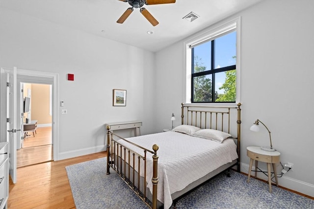 203 Middle St Unit 6, Weymouth, MA 02189 - bedroom featuring light wood-type flooring, baseboards, and a ceiling fan