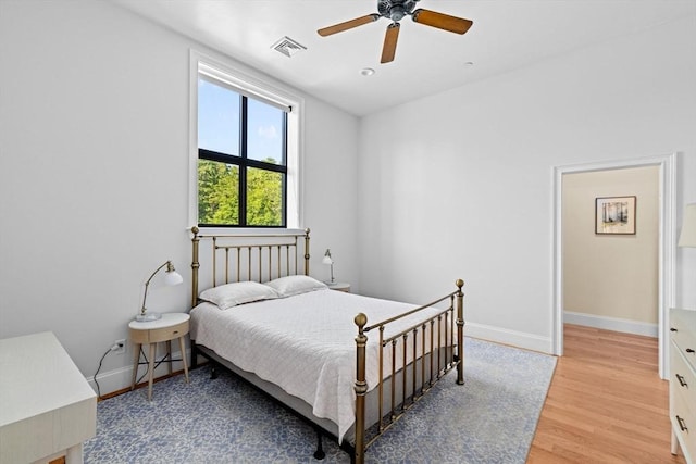 203 Middle St Unit 6, Weymouth, MA 02189 - bedroom with baseboards, light wood-style flooring, and ceiling fan