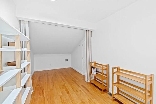 203 Middle St Unit 6, Weymouth, MA 02189 - bonus room with light wood-style floors, baseboards, and lofted ceiling