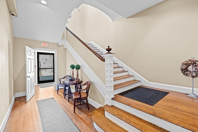 203 Middle St Unit 6, Weymouth, MA 02189 - entrance foyer featuring stairway, wood finished floors, and baseboards