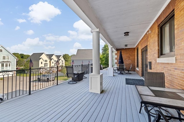 203 Middle St Unit 6, Weymouth, MA 02189 - wooden terrace with outdoor dining space and a residential view
