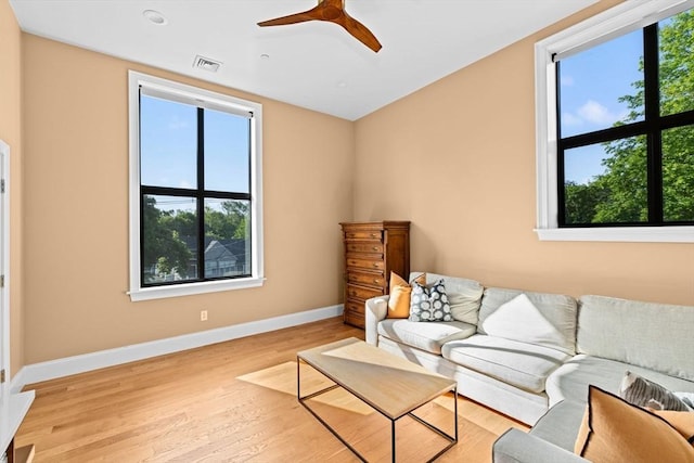203 Middle St Unit 6, Weymouth, MA 02189 - living area with healthy amount of natural light, baseboards, and light wood finished floors