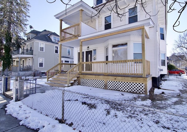 view of snow covered house